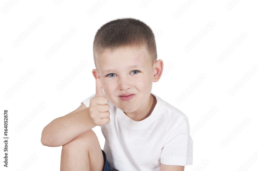 happy little boy showing thumbs up isolated on white happy little boy showing thumbs up isolated on white