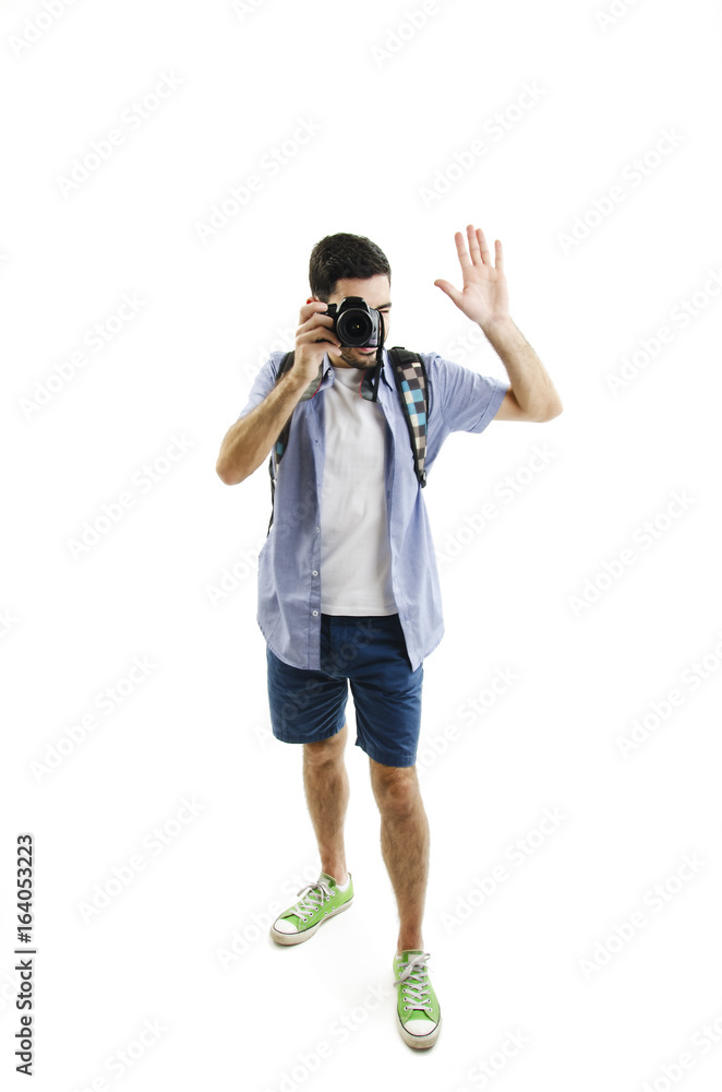Full length portrait of happy tourist photographer man taking picture. Isolated on white background Full length portrait of happy tourist photographer man taking picture. Isolated on white background