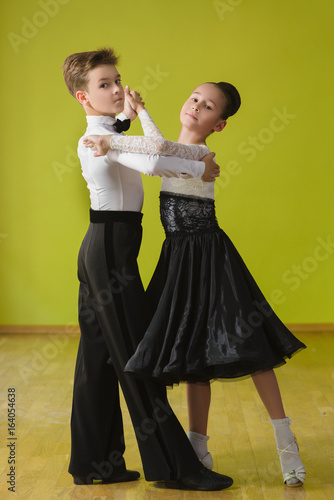 Dance children couple dancing ballroom dance in class