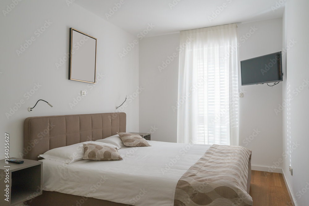 Fototapeta premium Interior of a bedroom in a villa