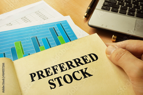 Book with page about preferred stock. Trading concept.