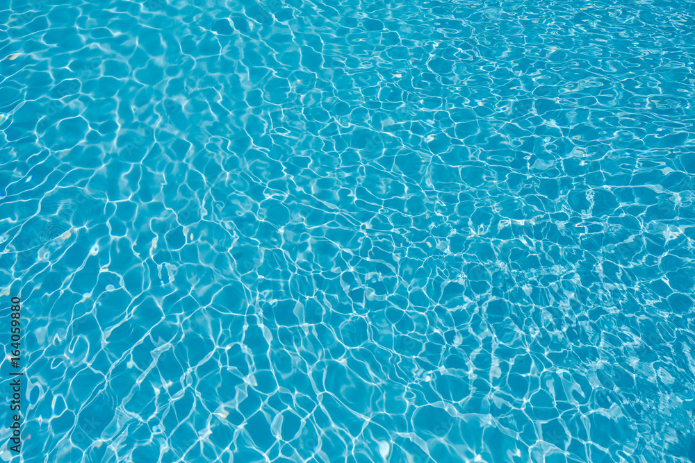 Beautiful ripple wave and blue water surface in swimming pool