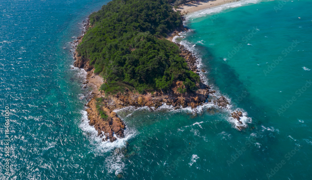 At Sea Island.Aerial view. Top view.amazing nature background.The color of the water and beautifully bright.Azure beach with rocky mountains and clear water of Thailand ocean at sunny day.