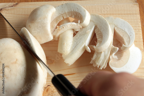 mushrooms on wooden background photo