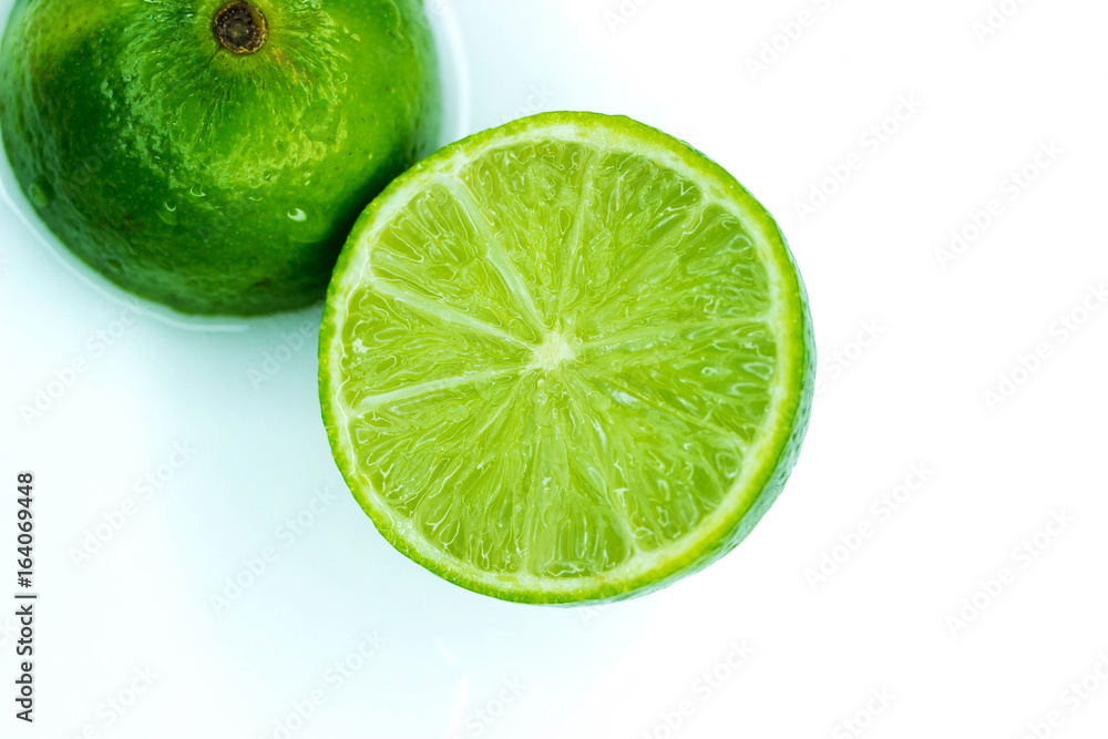 Juicy lime cut into two parts Juicy lime cut into two parts