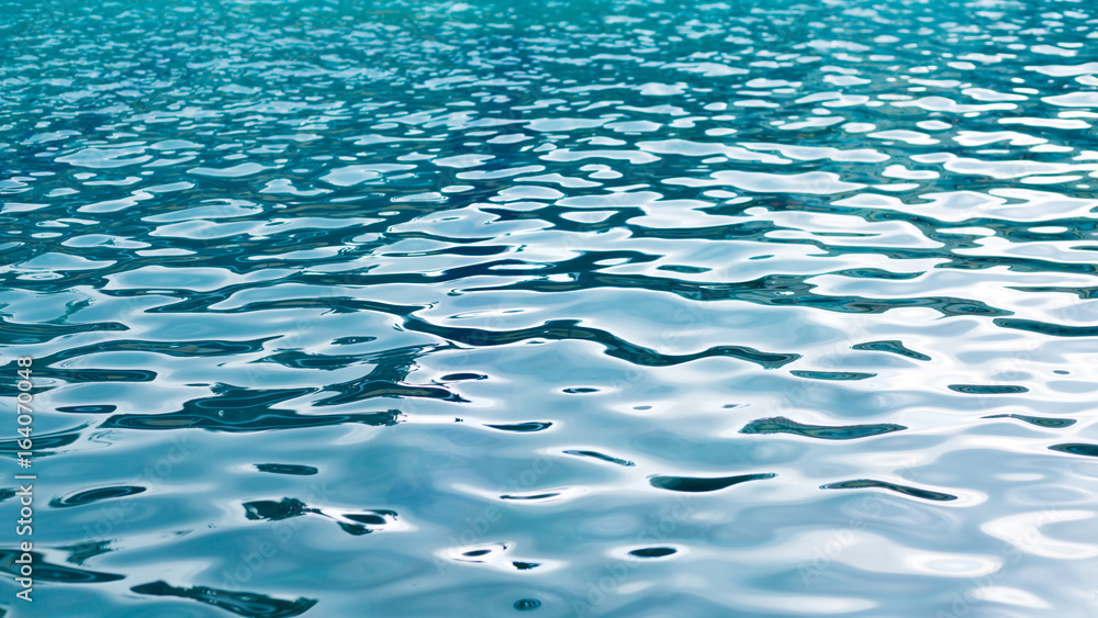 refreshing blue swimming pool water as a background. refreshing blue swimming pool water as a background.