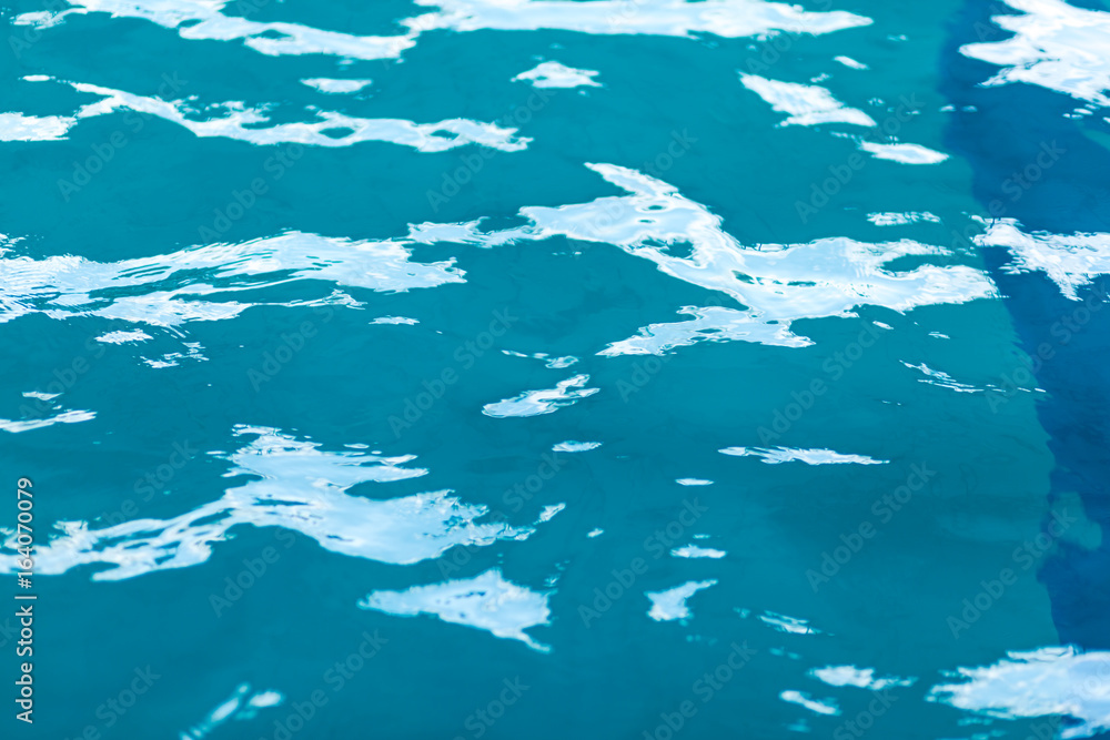 refreshing blue swimming pool water as a background. refreshing blue swimming pool water as a background.