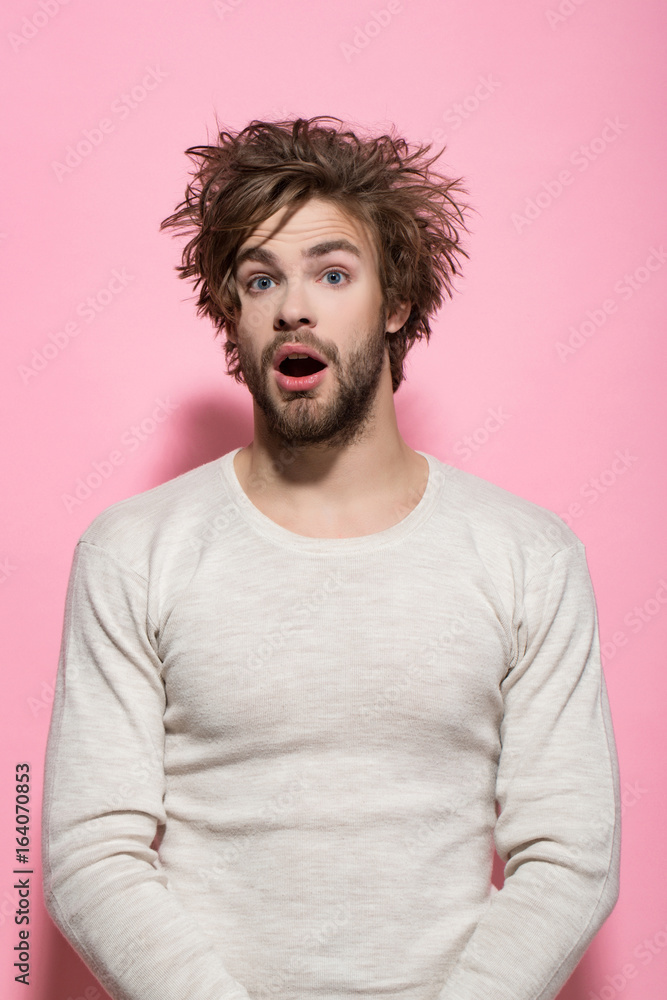 surprised man with long uncombed hair wake up in morning surprised man with long uncombed hair wake up in morning