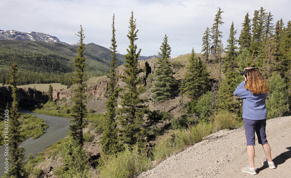 A Woman Shoots Photos on the Alpine Loop Backcountry Byway