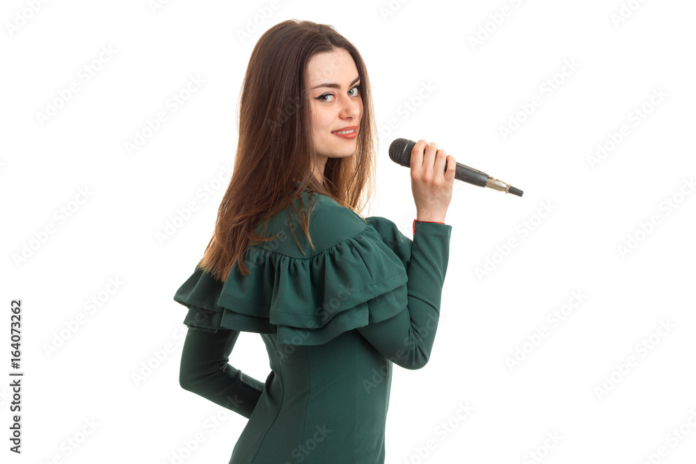 a charming young lady sings in karaoke and smiling a charming young lady sings in karaoke and smiling