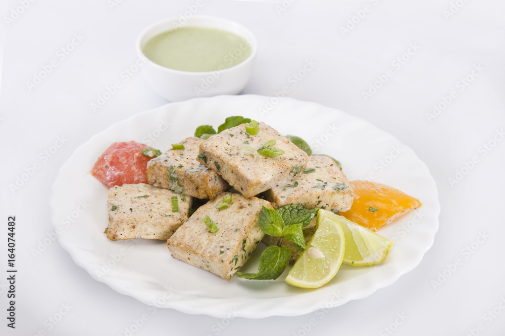 Paneer Tikka Kebab - Tandoori Indian cheese skewers with chili sauce Paneer Tikka Kebab - Tandoori Indian cheese skewers with chili sauce