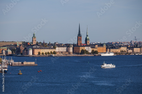 Scenic summer aerial view of old town, city hall and central embankments with boats. Stockholm, Sweden © yegorov_nick