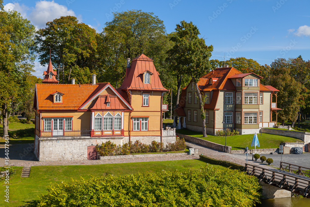 Cosy old wooden houses (luxury hotels) near Kuressaare castle. A view of Saaremaa island, Estonia.
