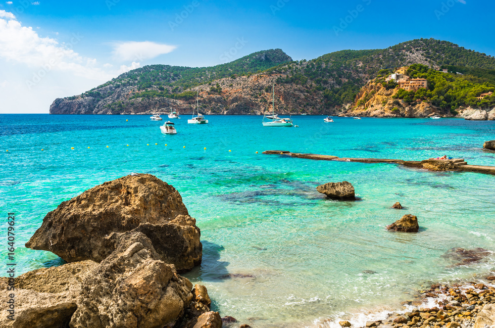 Beautiful bay with boats at the coast of Majorca island, Camp de Mar, Spain Mediterranean Sea