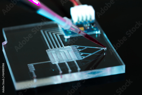 Obraz na plátně A lab-on-a-chip (LOC) is integration device with several laboratory functions