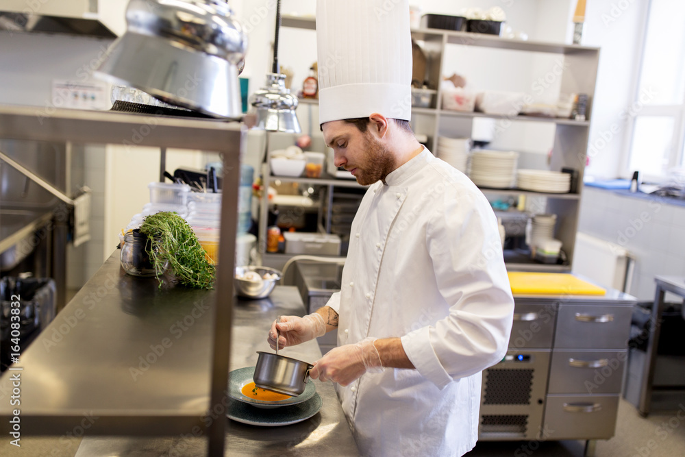 chef with pot cooking and serving food at kitchen chef with pot cooking and serving food at kitchen