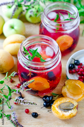 Sangria from apricots, apples and berries