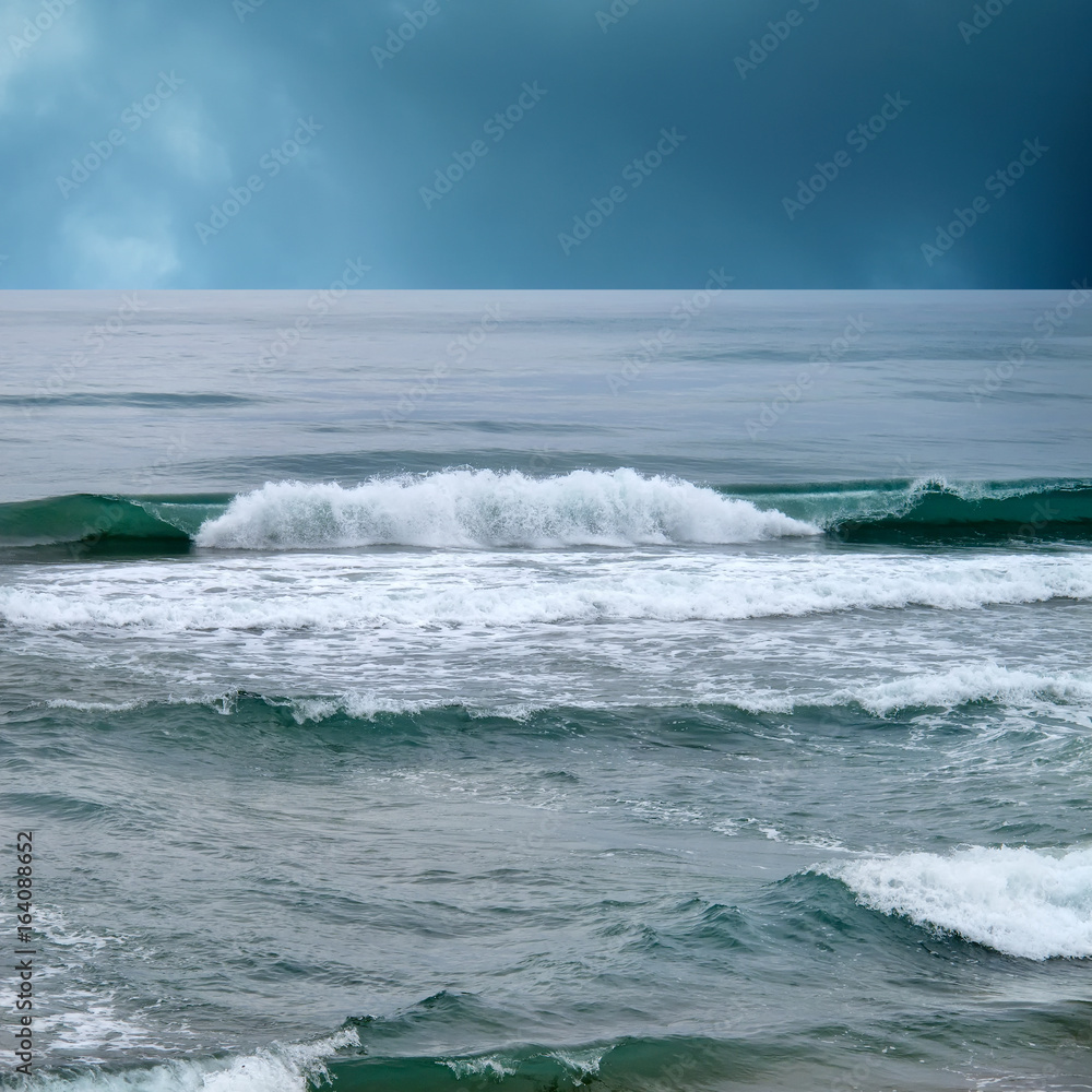 seascape image of stormy day on beach