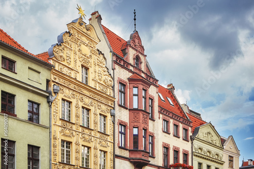 Facades of old houses in Torun old town, Poland.