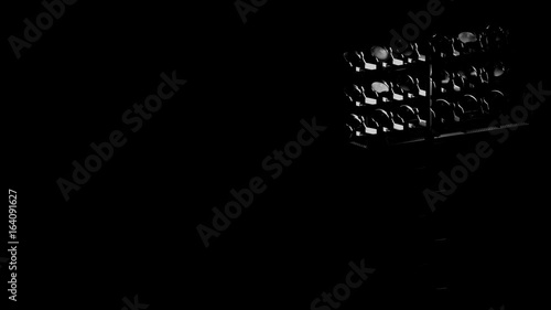 stadium flood lights turning on a black background 3d render illustration