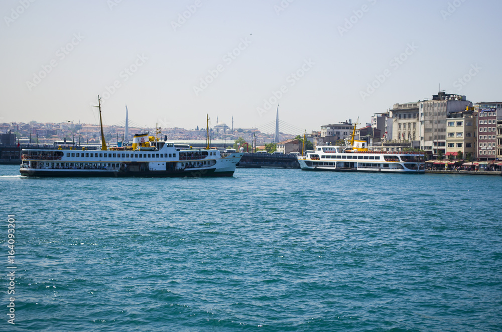 Passenger ship waiting Karakoy pier; Karaköy neighborhood in Beyoğlu, Istanbul