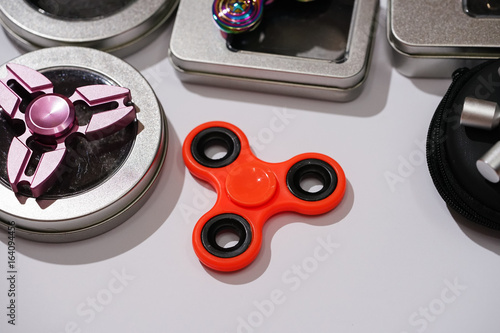 Hand spinners or fidgeting spinners. Many types and shapes of spinners put on the white background. 