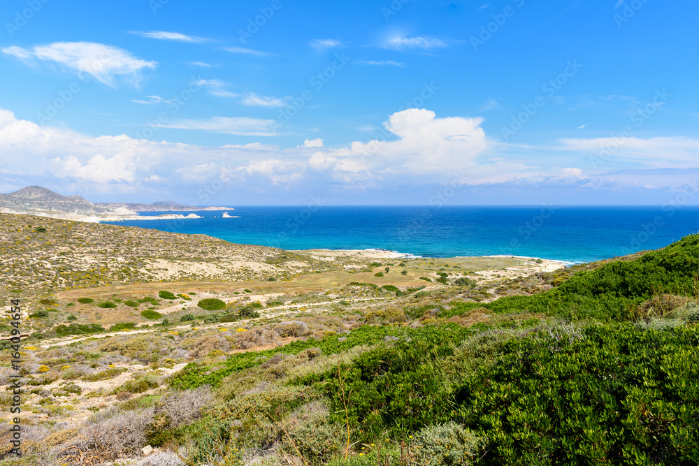 Beautiful coast with blue sea water on Milos island. Cyclades, Greece.