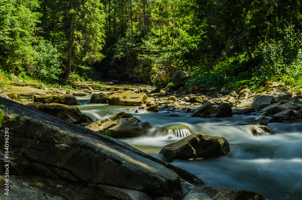 background landscape with waterfall in Yaremche vilage in Ukraine background landscape with waterfall in Yaremche vilage in Ukraine