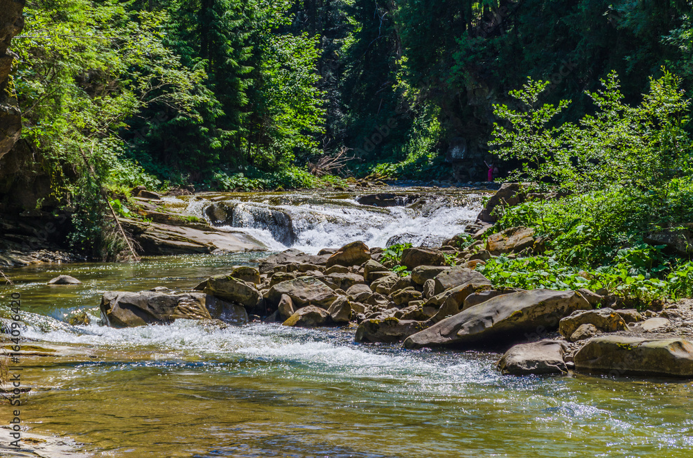 background landscape with waterfall in Yaremche vilage in Ukraine background landscape with waterfall in Yaremche vilage in Ukraine