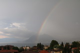 Summer thunderstorms and beautiful rainbow over Lake Maggiore in Stresa, Piedmont Italy