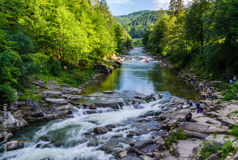 Fototapeta premium background landscape with waterfall in Yaremche vilage in Ukraine