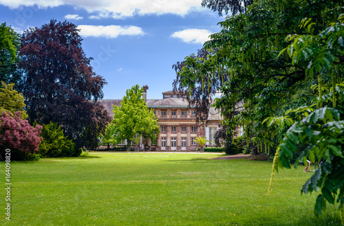 Tablou pe pânză Mansion and landscaped gardens,Scenic view of historical mansion and landscaped