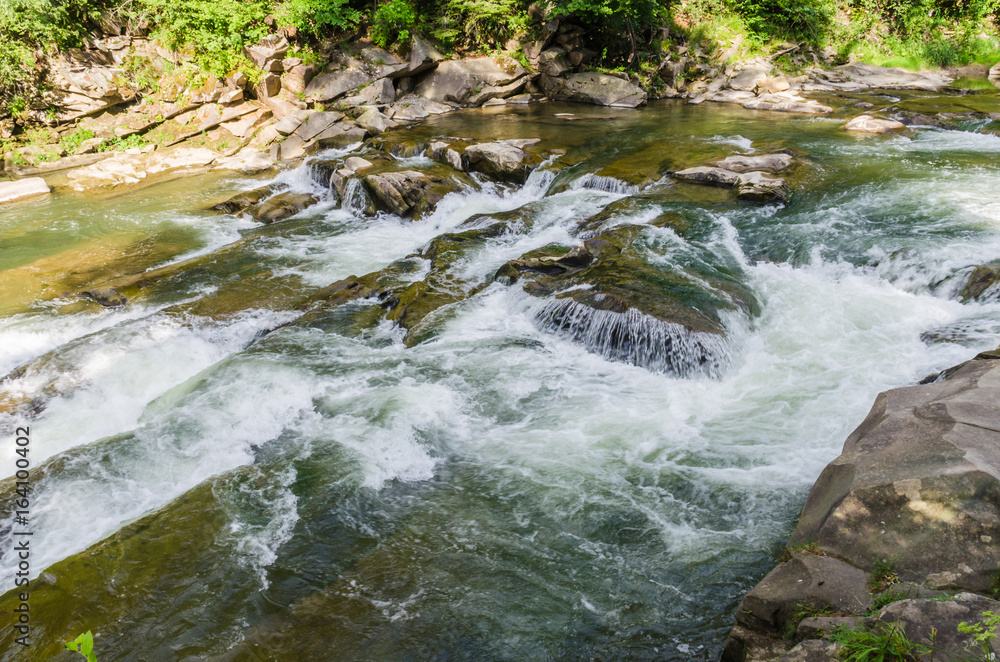 Fototapeta premium background landscape with waterfall in Yaremche vilage in Ukraine