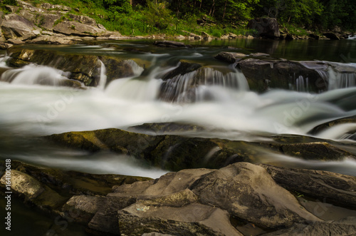 background landscape with waterfall in Yaremche vilage in Ukraine