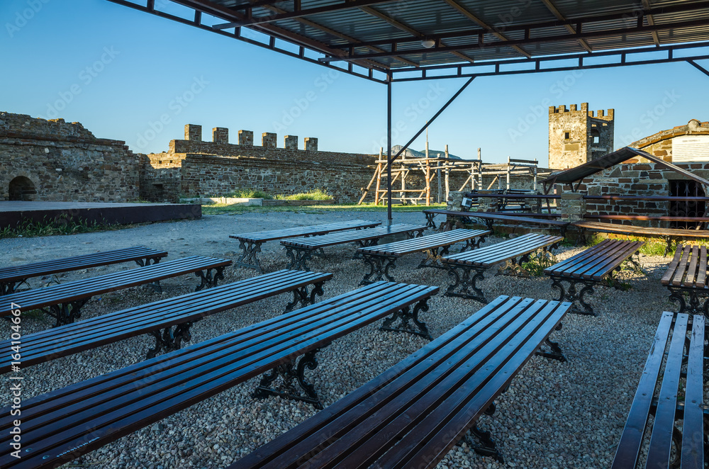 Spectator benches for street performances in Genoese fortress, Sudak, Crimea Spectator benches for street performances in Genoese fortress, Sudak, Crimea