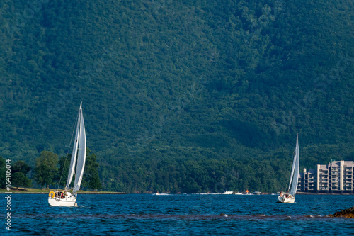 Two sail boats at the lake