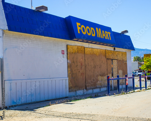 Failed Store With Boarded Up Windows photo