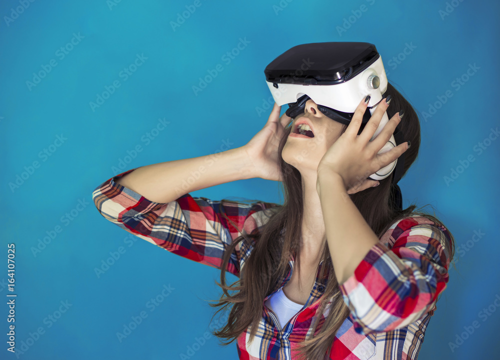 Girl using virtual reality headset Girl using virtual reality headset