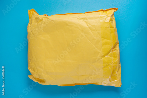 Yellow postal cardboard pac...