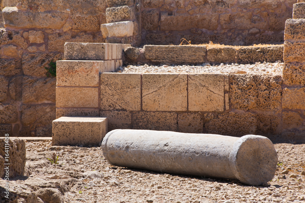 Roman falled stone pillar in cesarea Archaeological site close to Herod the Great hippodrome