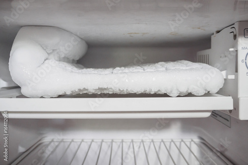 frozen Ice buildup in the freezer of refrigerator