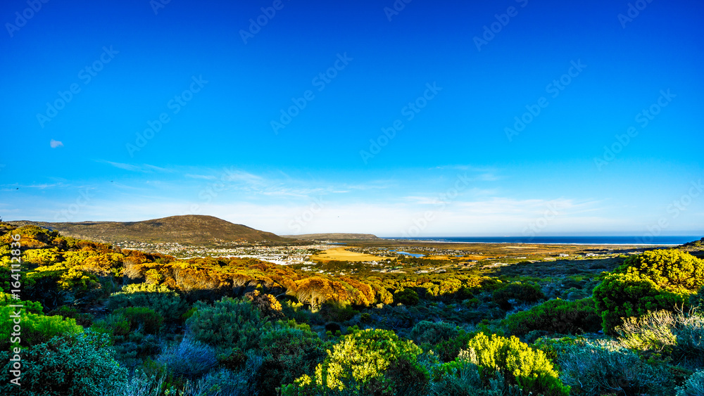 The Noordhoek and Kommetjie region in the Cape Town area viewed from the Ou Kaapse Weg, Old Cape Road, on a clear winter morning The Noordhoek and Kommetjie region in the Cape Town area viewed from the Ou Kaapse Weg, Old Cape Road, on a clear winter morning