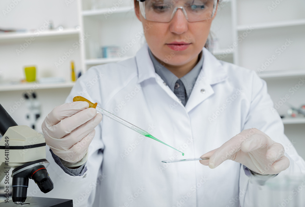 Laboratory assistant in the of food quality.Cell culture assay to test genetically modified seed