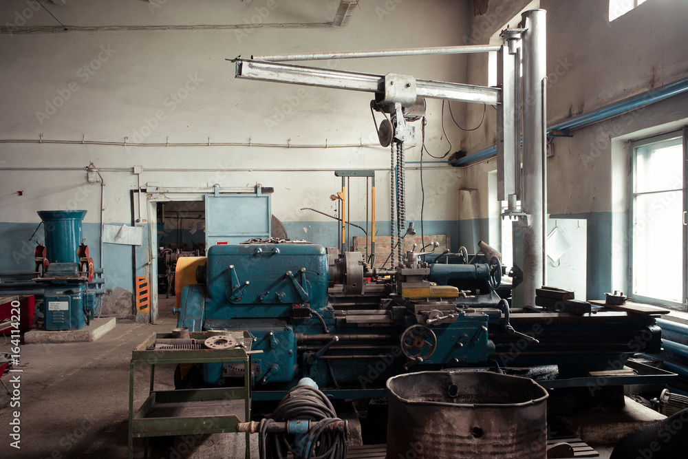 Fototapeta premium Old lathe workshop and cantilever crane