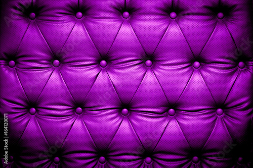 Purple leather texture with buttoned pattern