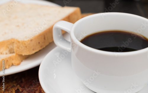 Black coffee and bread.