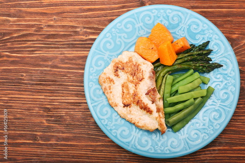 Roast turkey fillet with asparagus pumpkin and green beans