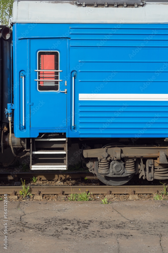 Window and door of the blue locomotive wagon. Window and door of the blue locomotive wagon.