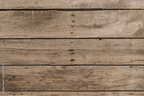Top view of brown rustic wooden background with horizontal planks