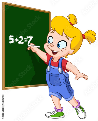 Girl writing on blackboard